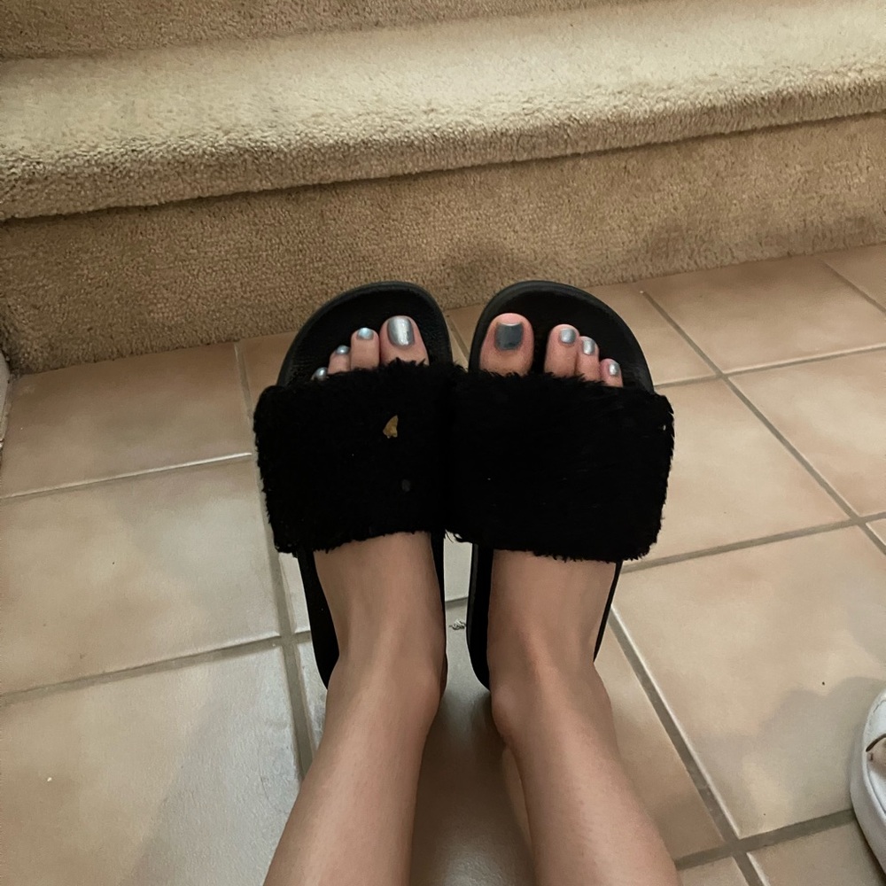 Worn Black Slippers